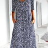 a dress in the shape of letters a with a round neckline