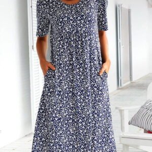 a dress in the shape of letters a with a round neckline