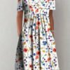 a dress in the shape of letters a with a short sleeve