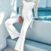 a suit with a lace spanish neckline