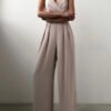 a suit with a neckline in the shape of the hearts and wide legs