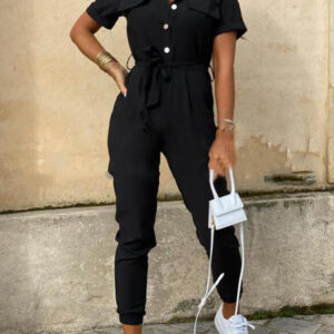a suit with a short sleeve with buttons and pockets