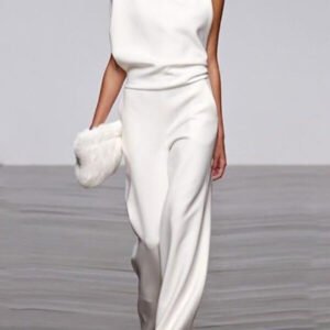 a suit with an open arm and a loose bottom 4