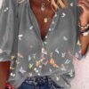 blouse for buttons with a wide sleeve
