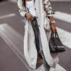 coat with a loose cut with large pockets and a hood