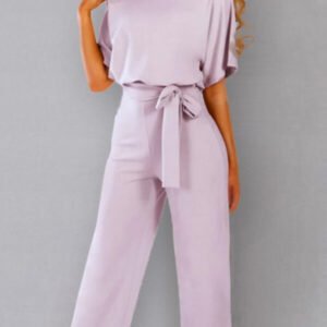 cut suit with a bat cut and binding at the waist 5