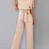 cut suit with bat cut and binding at the waist 3