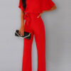 cut suit with bat cut and binding at the waist 6