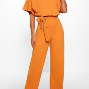cut suit with bat cut and binding at the waist 7
