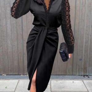 draped dress with lace inserts on the sleeves and neckline