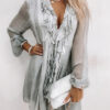 dress with a translucent material with frills