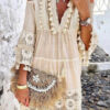 dress with lace inserts with tassel