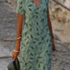 knee length dress with a neckline in shape letters v 2
