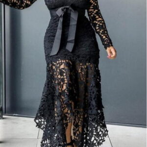 lace dress with a decorative ribbon at the waist