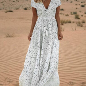maxi dress with a deep neckline and tassels
