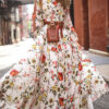 maxi dress with discharge on the sleeves and a flared bottom