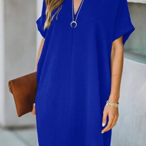mini dress with a loose cut with a neckline in the shape of the letter v 2