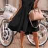 mini dress with a loose cut with frills at the sleeves