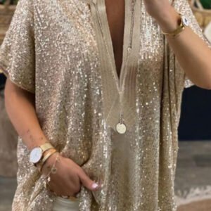 sequinous blouse with a loose cut with a deep neckline