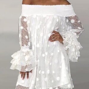 spanish dress with transparent material with a frilling sleeve