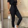 t shirt suit with a short sleeve with decorative buttons