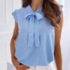 top binded under the neck with frills at the sleeves