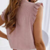 top binded under the neck with frills at the sleeves 3